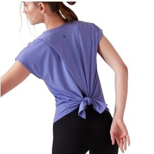 ATHLETA Explore Tee Adonis Blue (Purple) Women’s size Large Tie back gym wear